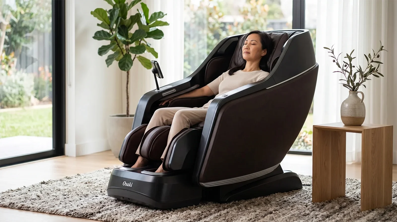 Person relaxing in the Osaki JP-Nexus 4D massage chair in a premium living room